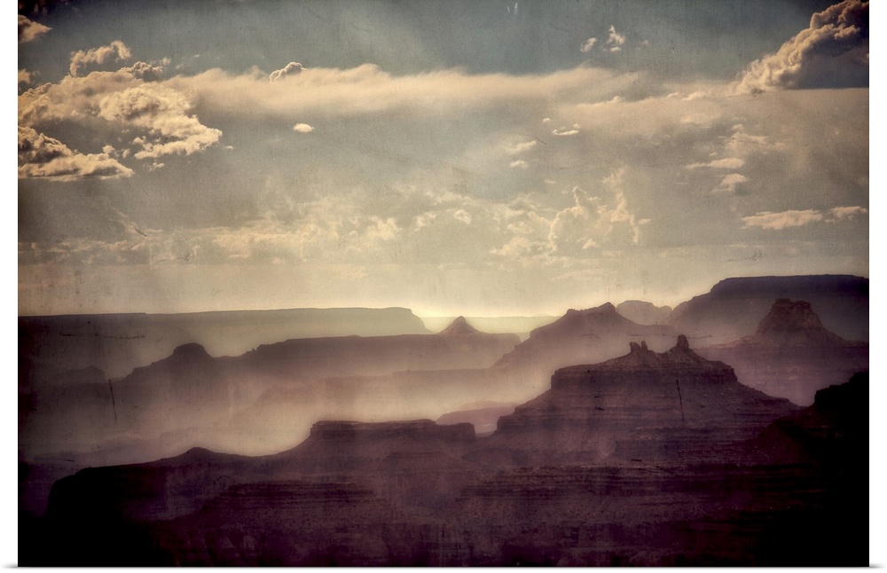 Beautiful view of the Grand Canyon  in USA with raylights in a blue summer sky with texture layer