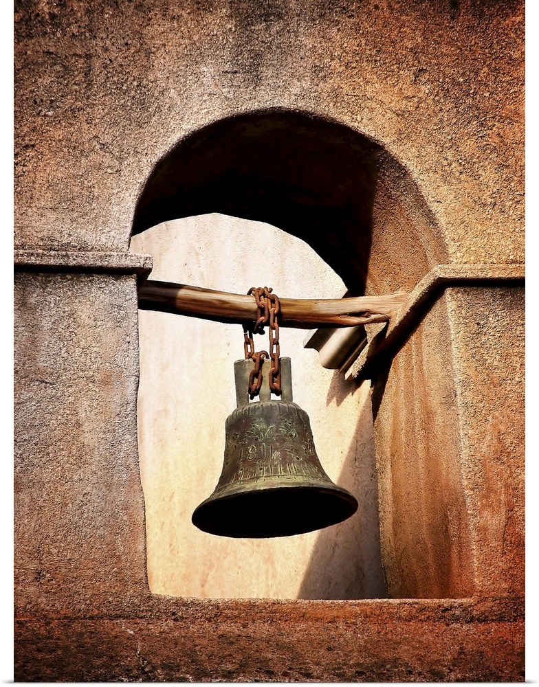 A bell hanging in a tower