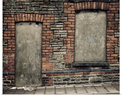 Concreted in derelict doorway and window