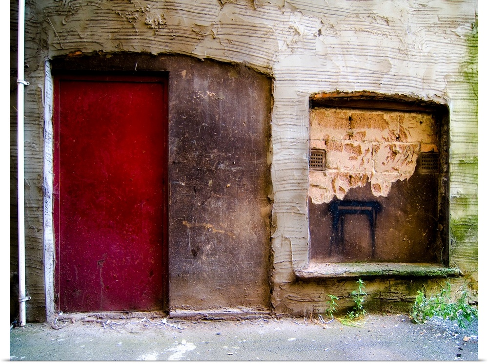 Derelict door and window with graffiti