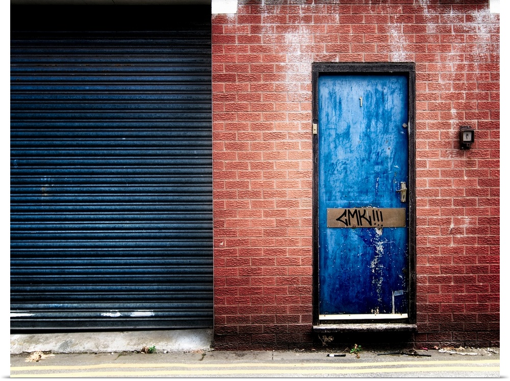 Derelict door with graffiti
