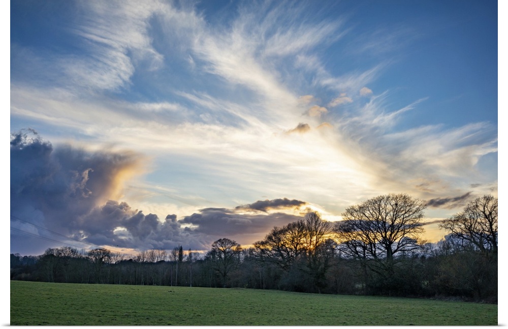 Dramatic evening sky over the West Sussex landscape near Nutbourne in England.