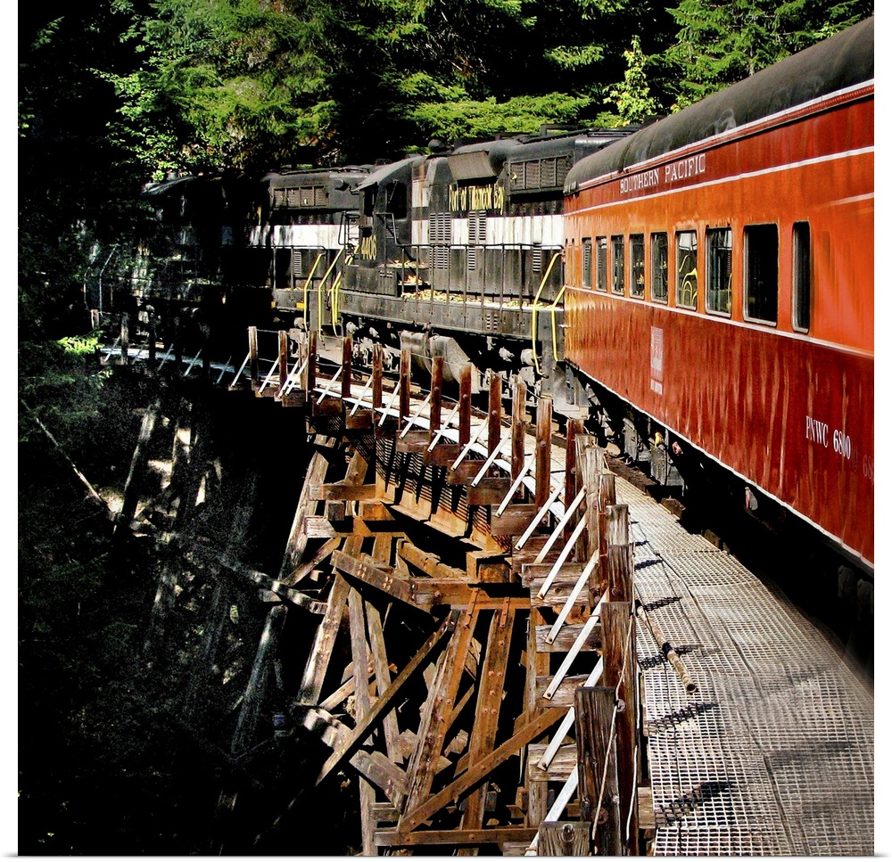 A train crossing a wooden bridge