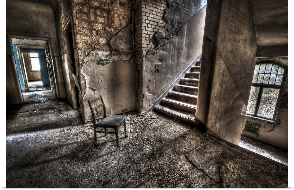Abandoned lunatic asylum north of Berlin, Germany. Chair with stairs