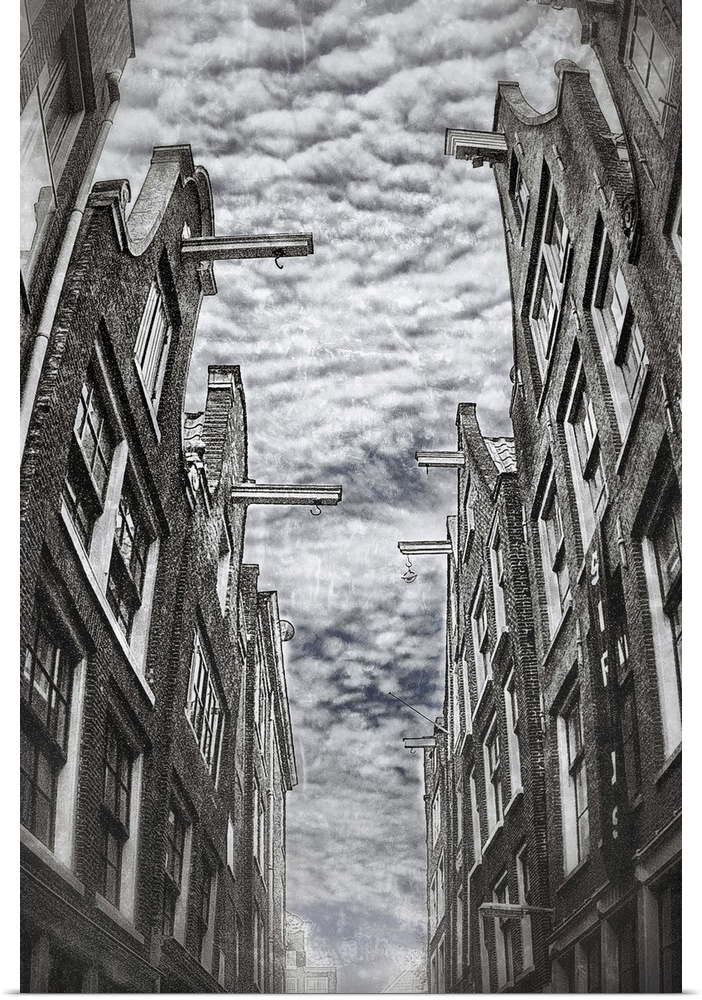 A narrow street of Amsterdam, covered of clouds