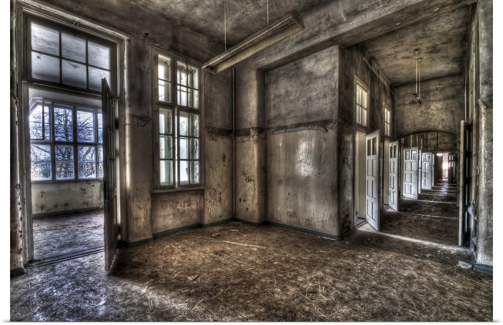 Abandoned lunatic asylum north of Berlin, Germany. Empty room with corridor.