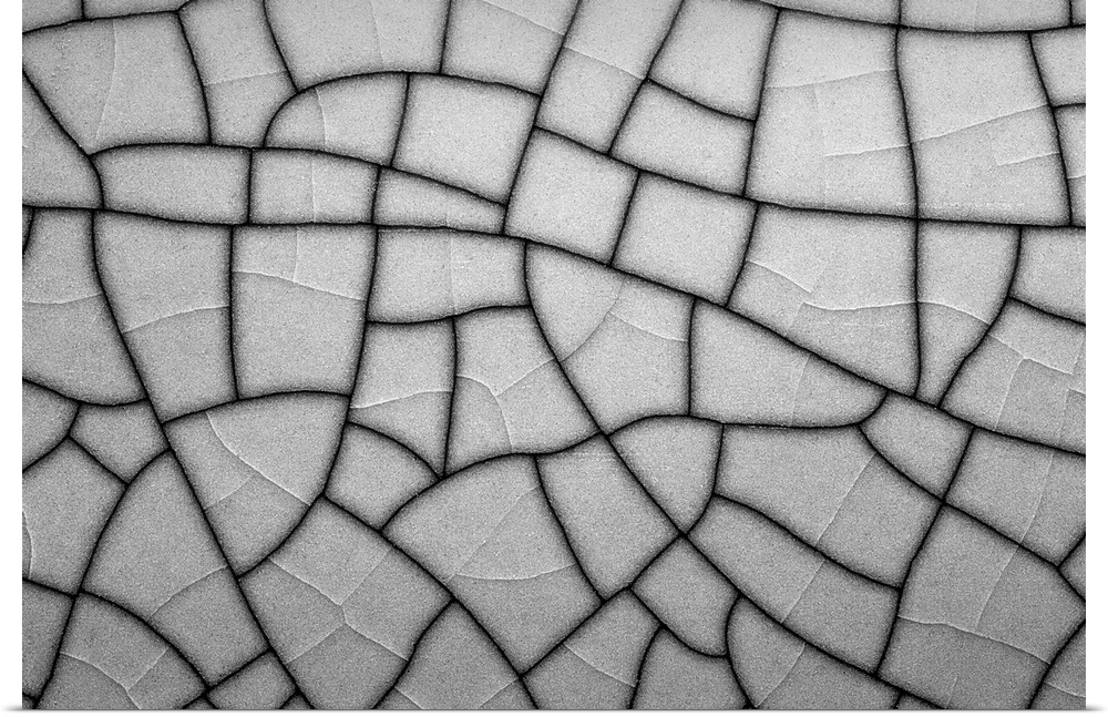 Close up/macro of a  porcelain crackle plate creating line patterns abstract in black and white.