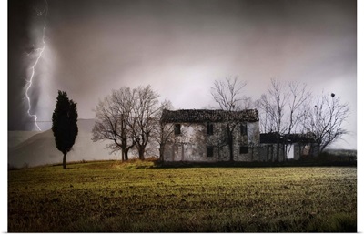 Ruined cottage in a stormy day and lightning in Castel Frentano, Italy