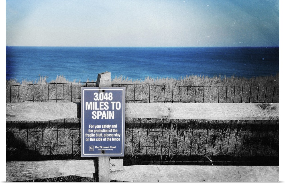 Sign on Nantucket Island, Massachusetts, giving the distance to Spain. 50s studio style with added textures.