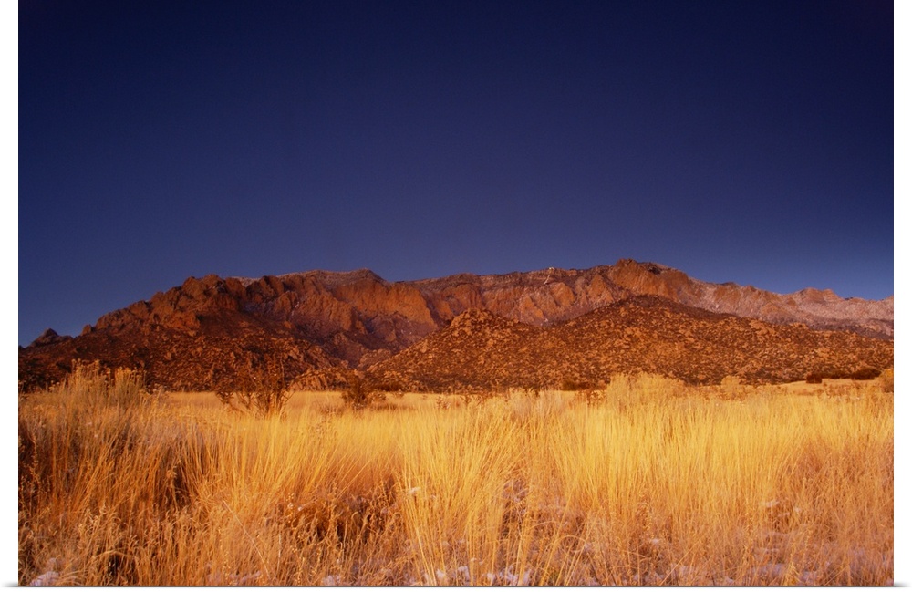travel destinations: the sandia mountains desert twilight landscape glows, albuquerque, new mexico