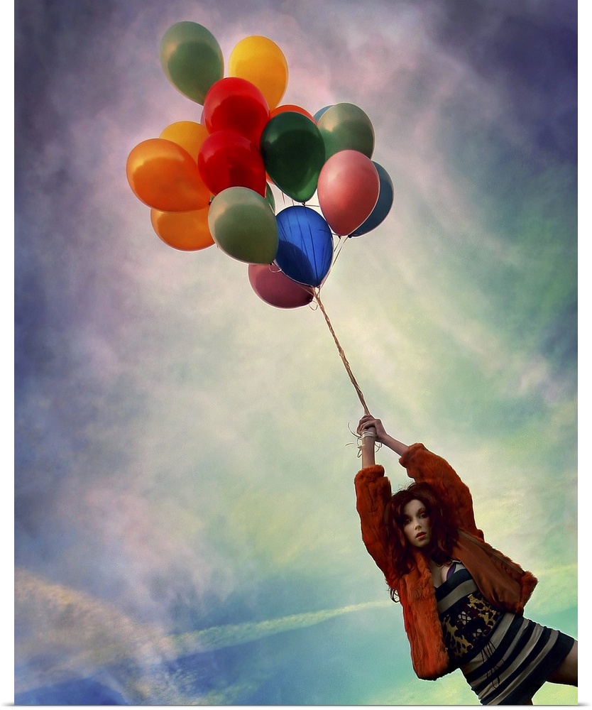 A young woman holding balloons