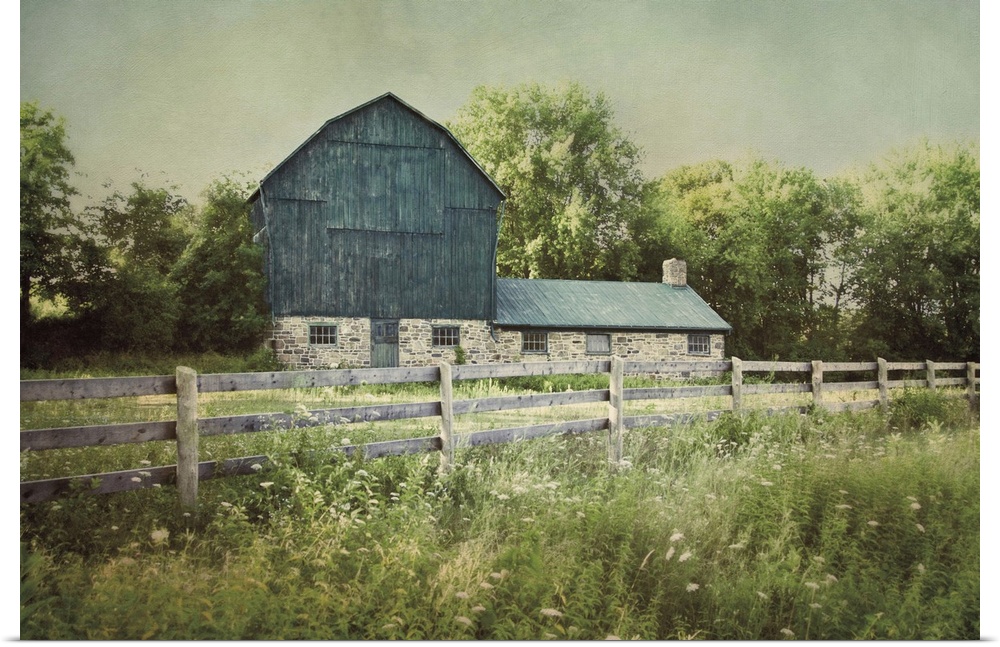 A photograph of a blue barn.