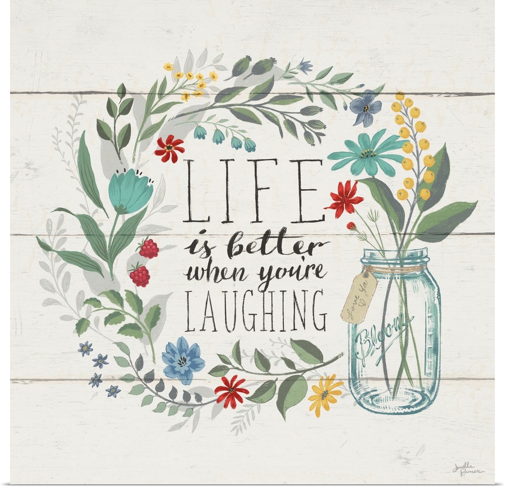 "Life is Better When You're Laughing" written inside a floral wreath on a white wood paneled background.