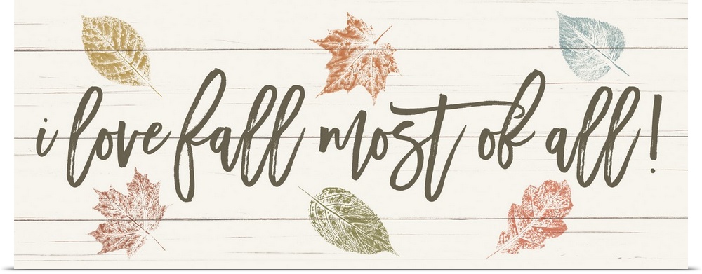 "i love fall most of all!" on a white wood plank background with fall leaves.