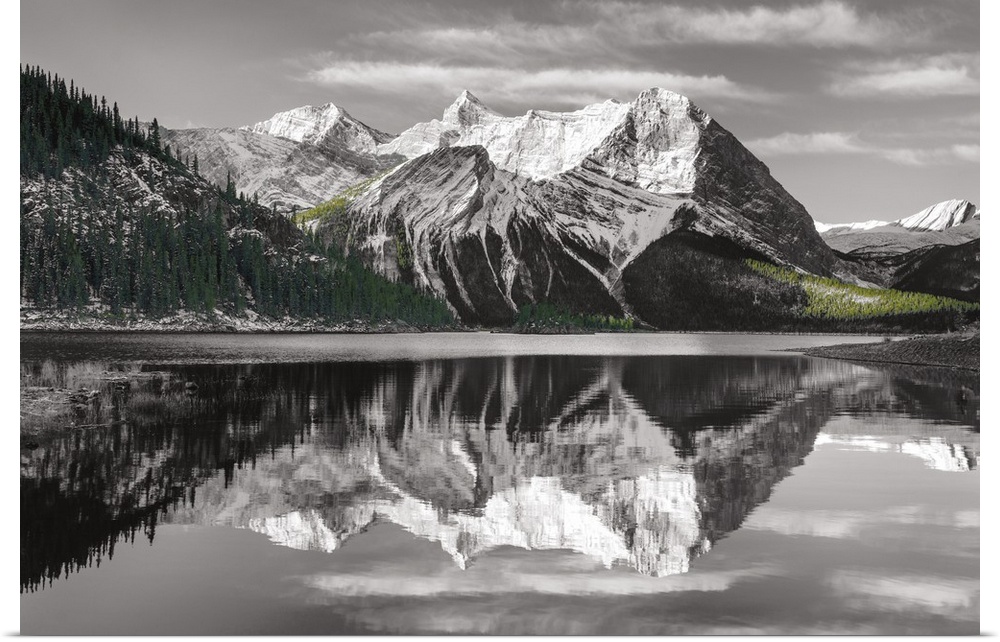 Photograph of a sunrise at Emerald Lake, Yoho National Park British Columbia in black and white with green trees.