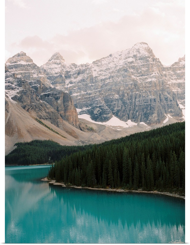 Photograph of the trees and moutains surrounding Moraine Lake, Banff national park, Canada.