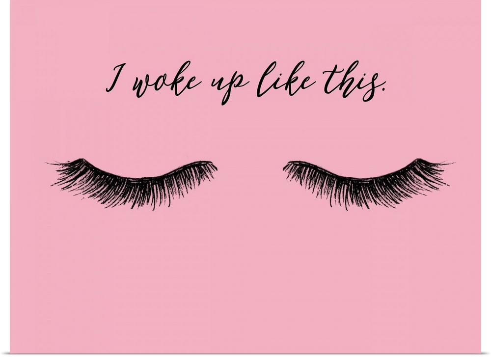 "I Woke Up Like This" with eyelashes in black on a pink background.