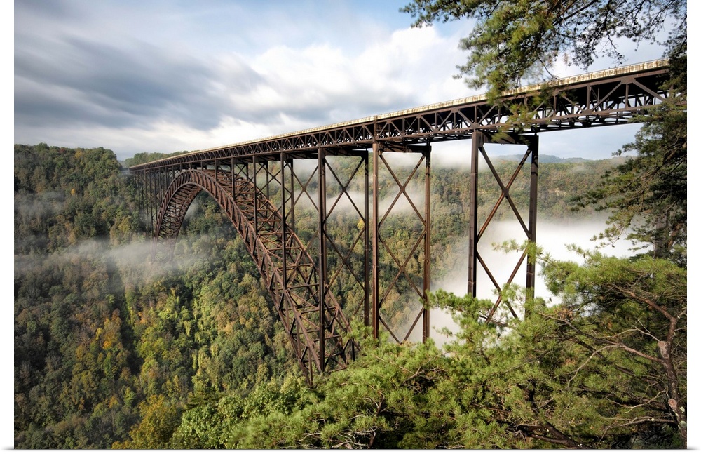 A long bridge over a foggy forest valley in West Virginia.