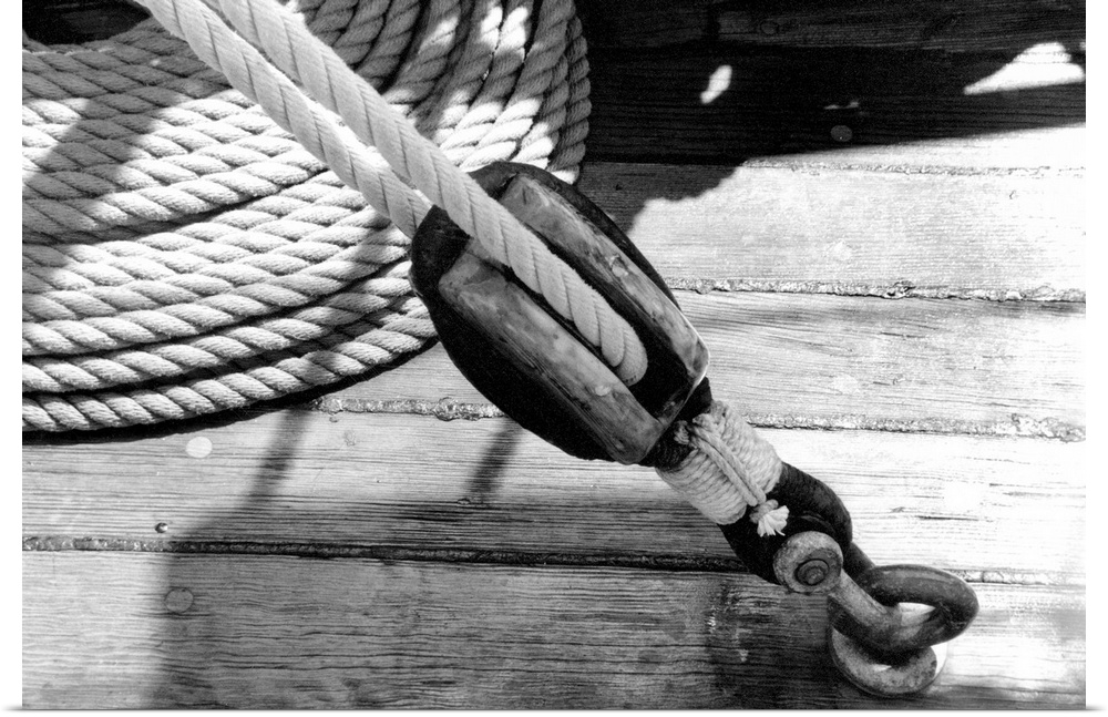 Black and white photograph of details of a sailboat.