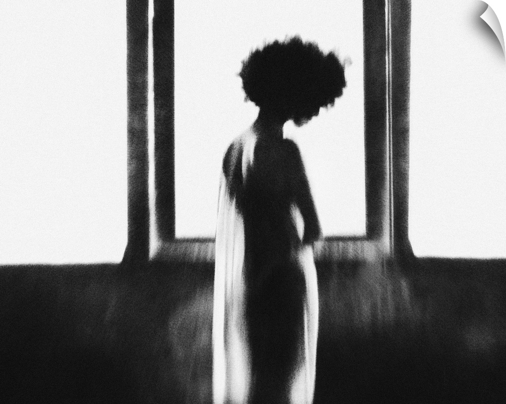 A silhouetted female figure in sheer cloth stands in front of a large glowing window.