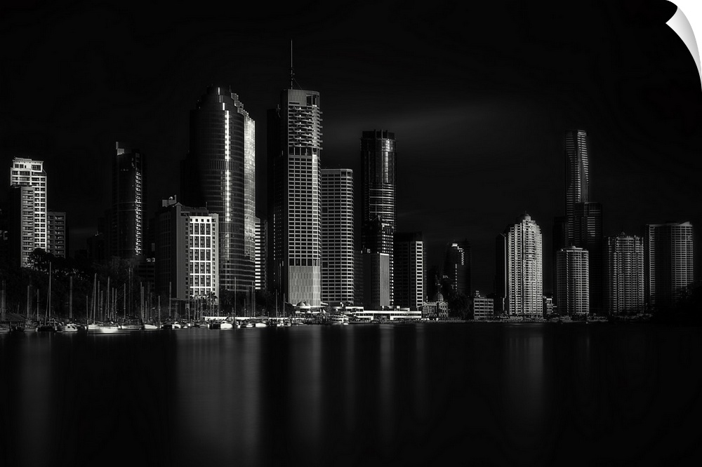 A black and white photograph of the Brisbane skyline in Australia.