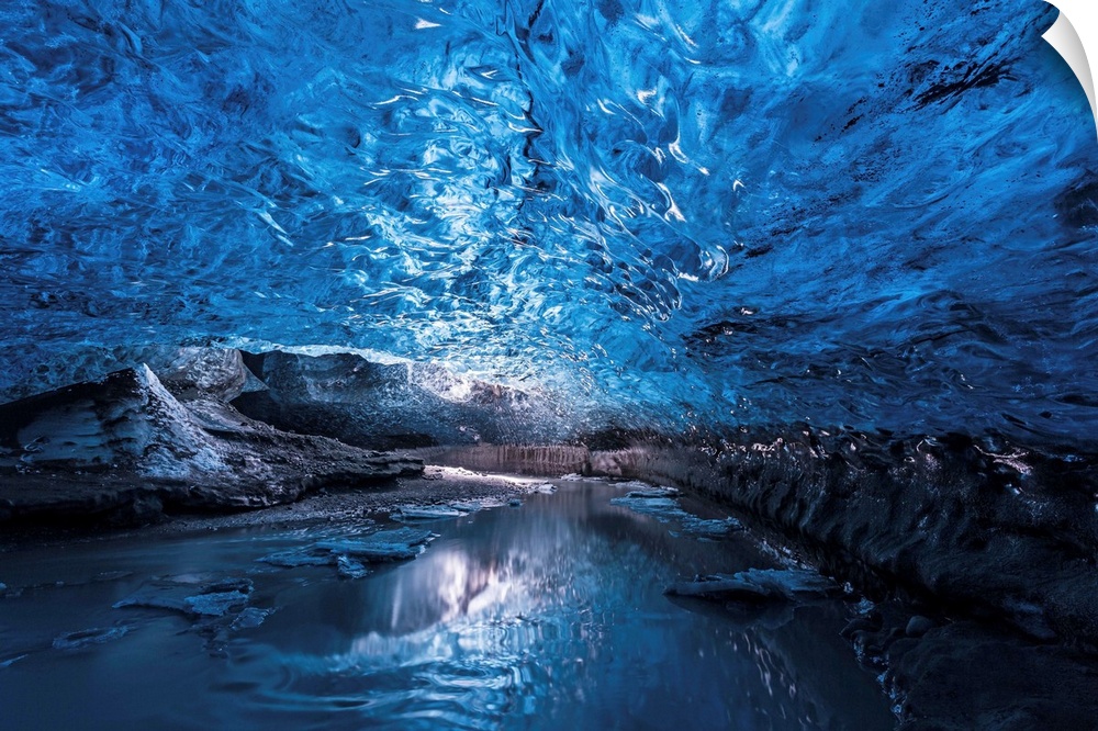 A view of the ceiling of an ice cave from inside it, Iceland.