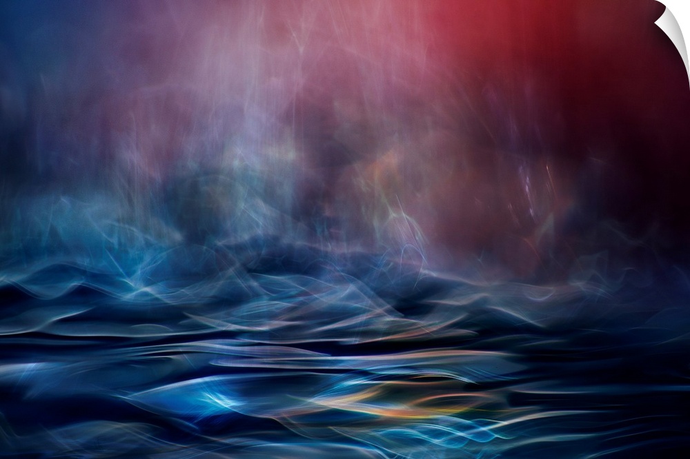 Abstract image made of blurred light and color, resembling an ocean in the evening.