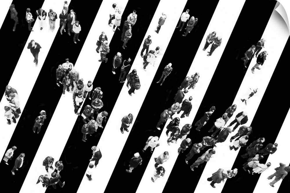 Black and white aerial image of a group of people standing in a striped road.