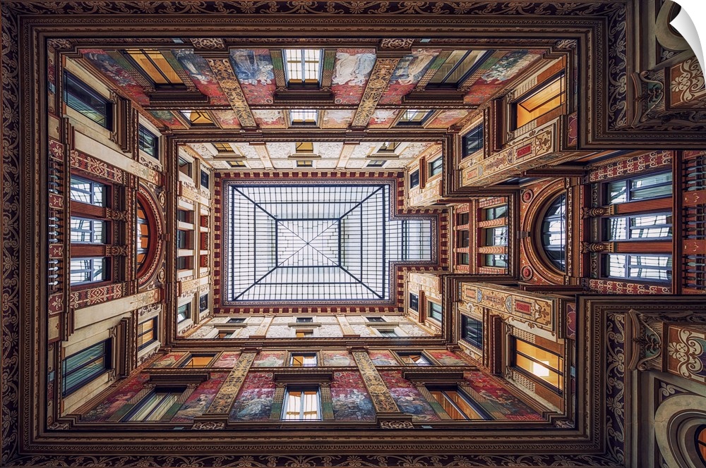 Architectural abstract photograph looking up towards the ceiling in Galleria Sciarra, highlighting all of the fine painted...