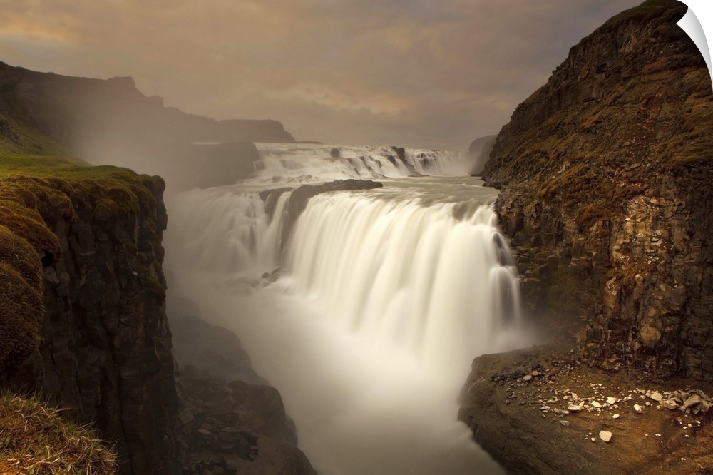 A view of the beautiful Gullfoss Waterfall in the mountains of Iceland.