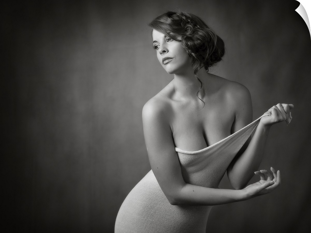 Elegant black and white portrait of a woman undressing.