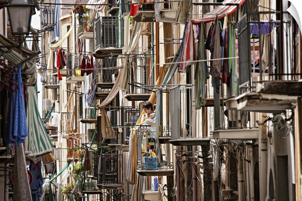 Several clothes drying on laundry lines, Sicily, Italy.