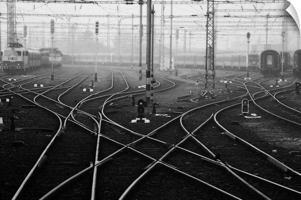 Criss-crossing rail lines and wires at a train station in Budapest.