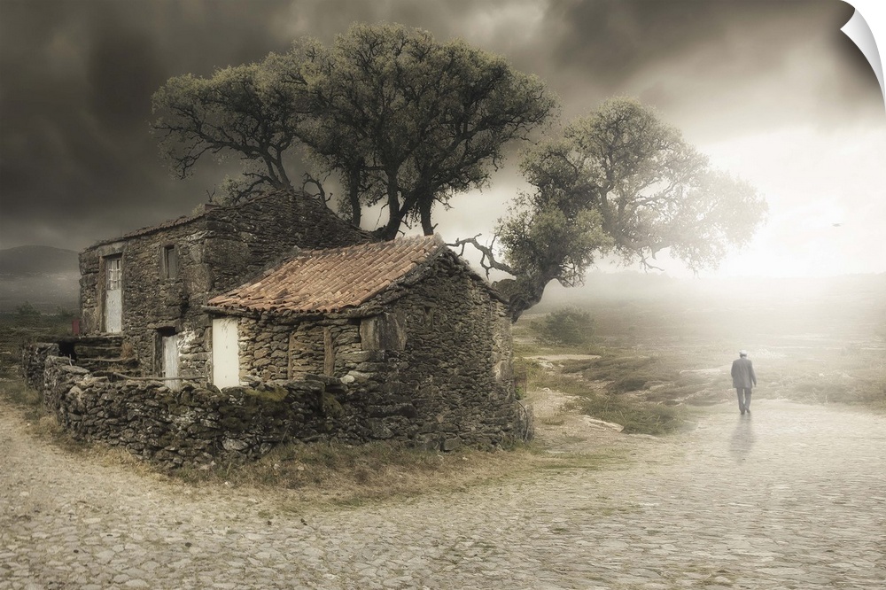 Conceptual photograph of a man walking away from a countryside cottage.