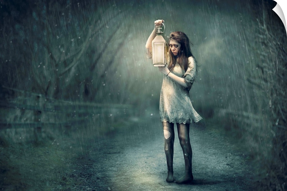 A conceptual photograph of woman in tattered clothing holding a lantern in the rain.