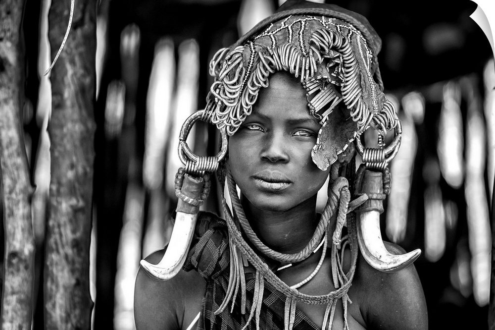 A portrait of a tribeswoman with a unique headdress.