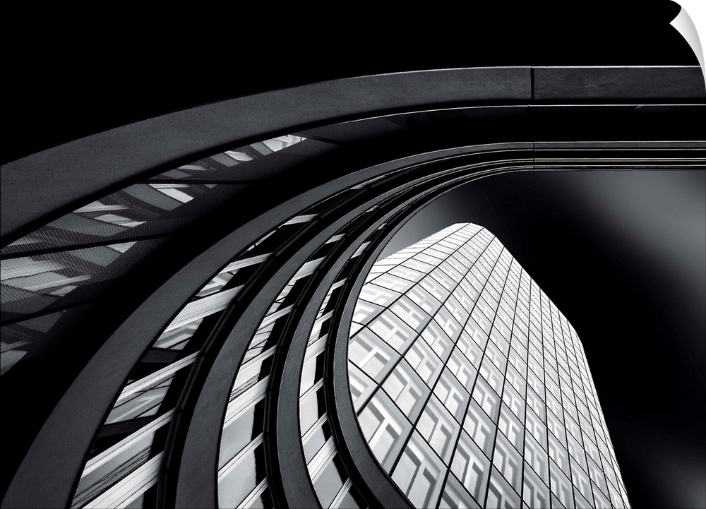 Curved architecture of a glass and metal building, Munich, Germany.