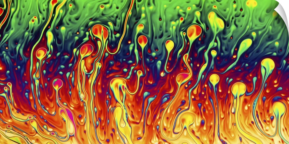 Abstract image of soap bubbles with enhanced rainbow colors.