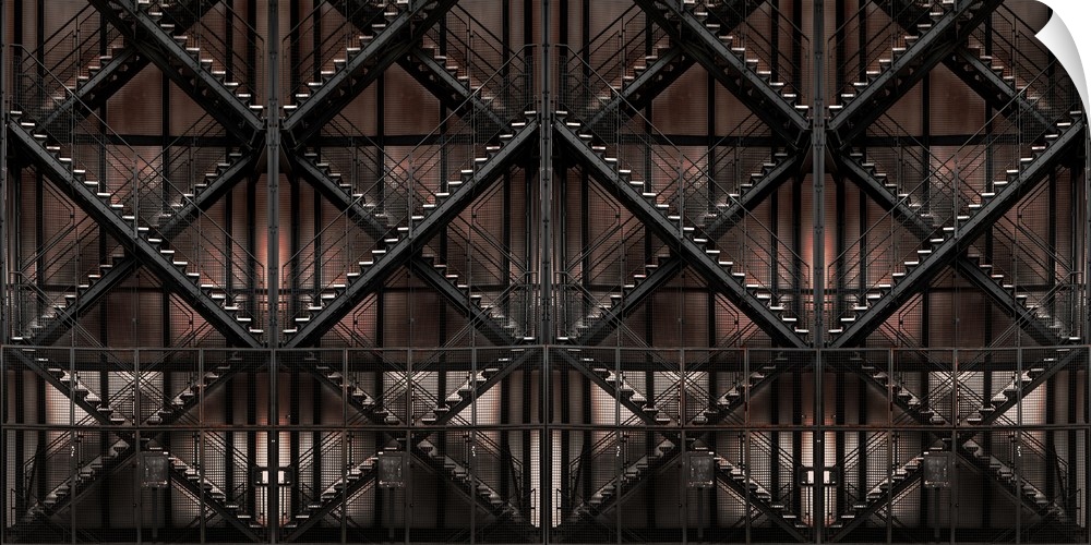 Architectural abstract photograph of crossing staircases creating a pattern.