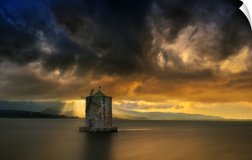 Landscape photograph of calm water and a dramatic sky in Italy.