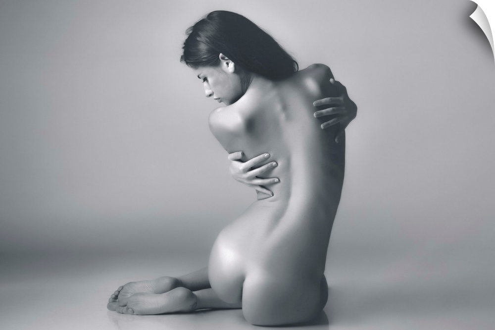 A photograph of a nude female study.