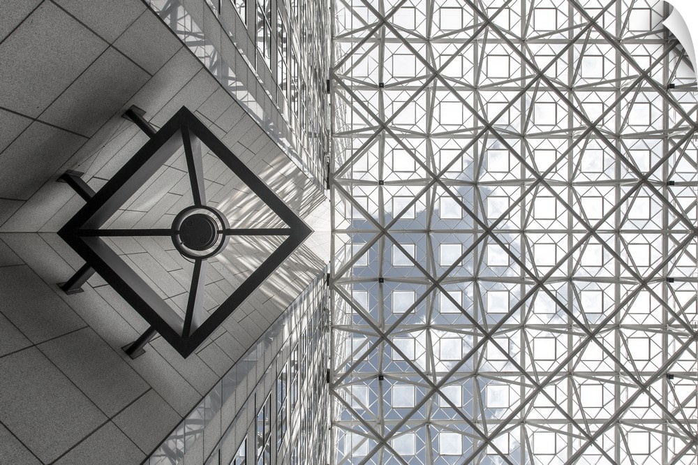 Looking up at an abstract architectural framework design.