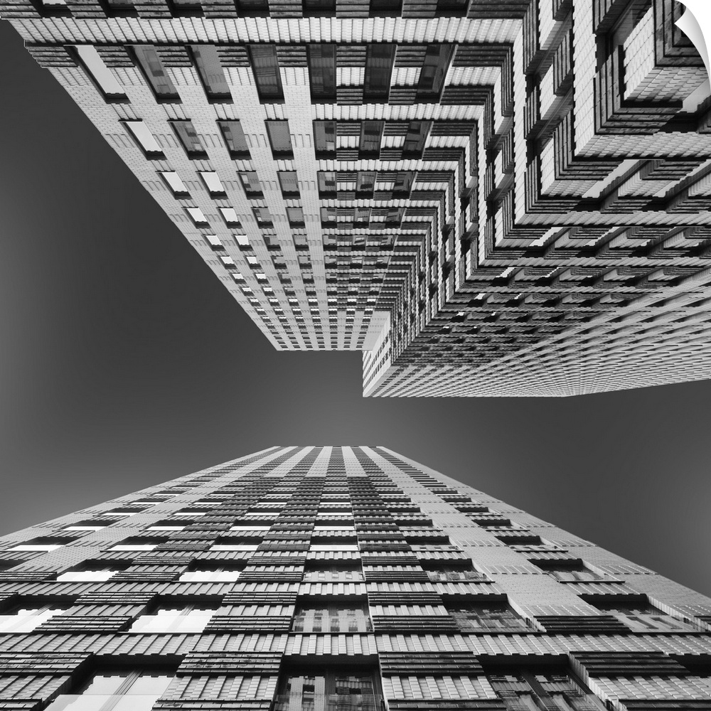 Black and white image of skyscrapers seen from the ground, creating an abstract image.