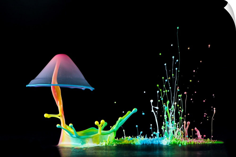 A macro photograph of a colorful tiny splash of water resembling a mushroom.
