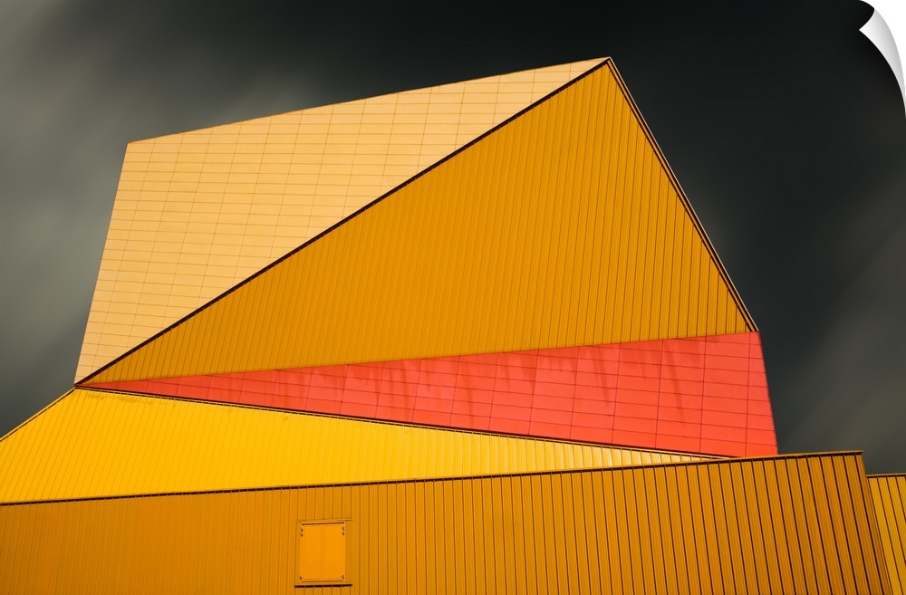 Angular yellow roof of the Agora theater in Lelystad, Netherlands.