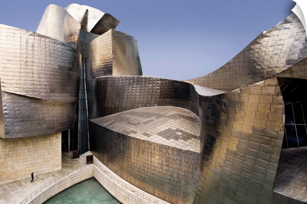 The impressive curves of the titanium and glass walls of the Guggenheim Museum in Bilbao, Spain, designed by Frank Gehry.