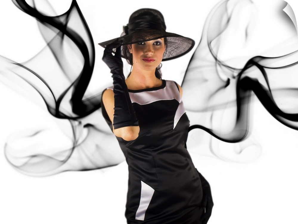 Portrait of a woman dressed in black with dark smoke around her.