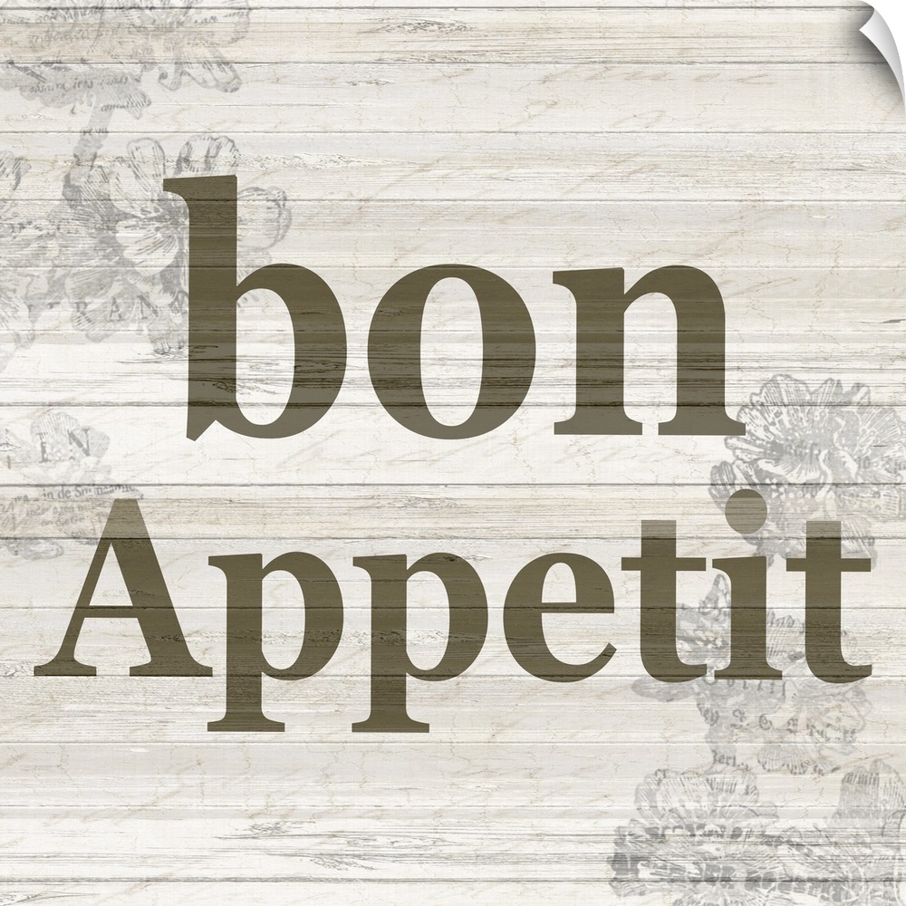 The word ?bon appetit? on a wood panel background with a faded floral design.�
