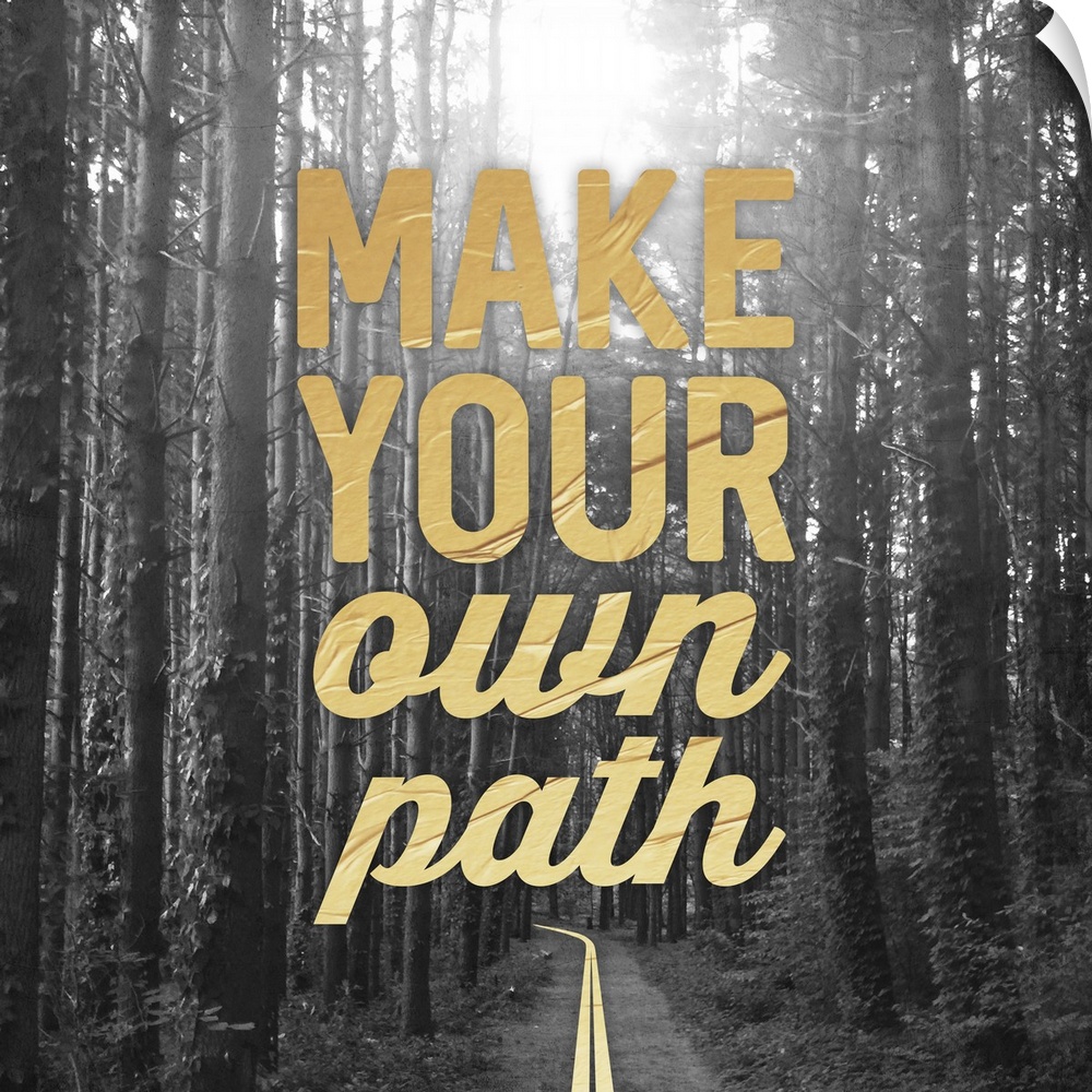 A black and white square photograph of a path in the woods with the phrase ?make your own path? placed on top in gold.�