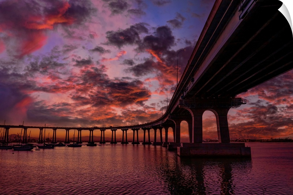 The Coronado Bridge spans the City of San Diego to Coronado Island. This image taken before sunrise and calm waters on San...